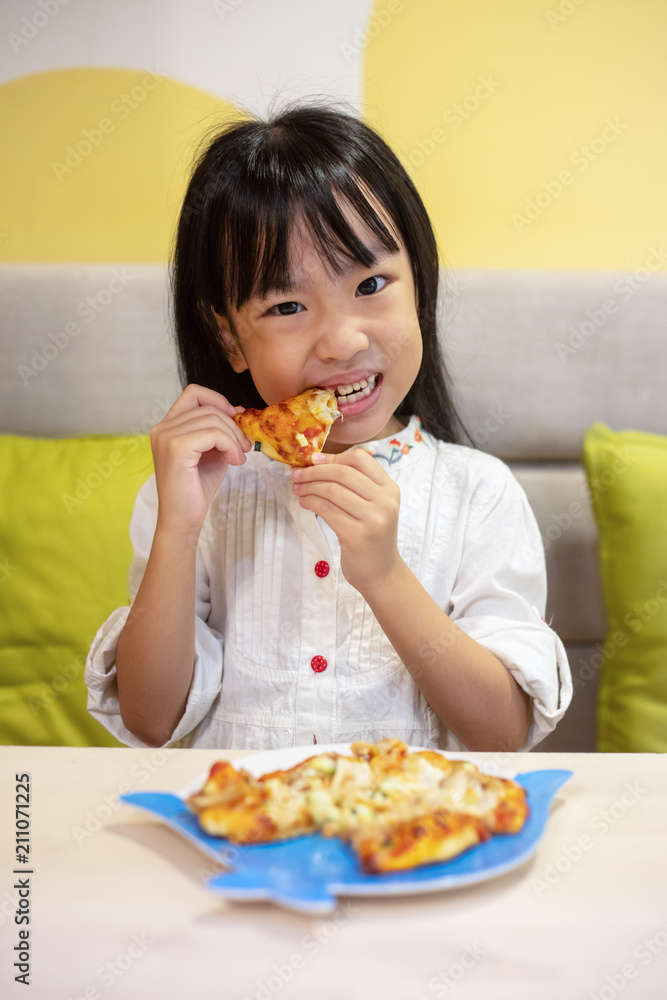 Asian Little Chinese Girl Eating pizza Asian Little Chinese Girl Eating pizza