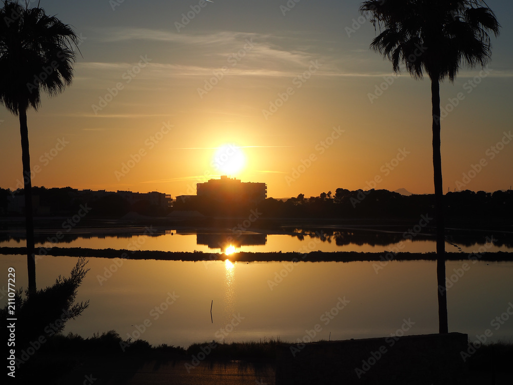 Amazing landscape of the beautiful salt flats during the sunset at Colonia de Sant Jordi, Ses Salines, Mallorca, Spain Amazing landscape of the beautiful salt flats during the sunset at Colonia de Sant Jordi, Ses Salines, Mallorca, Spain