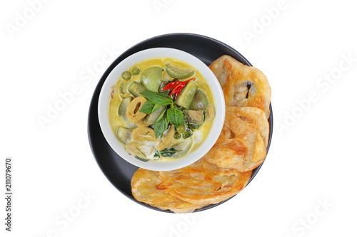 Ready served of Roti , Indian food as deep fried flour ,with Thai green curry.