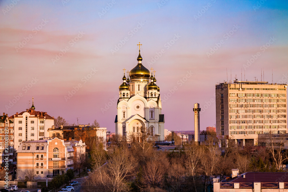 Khabarovsk cityview in the sunset with a cathedral on the  horizon