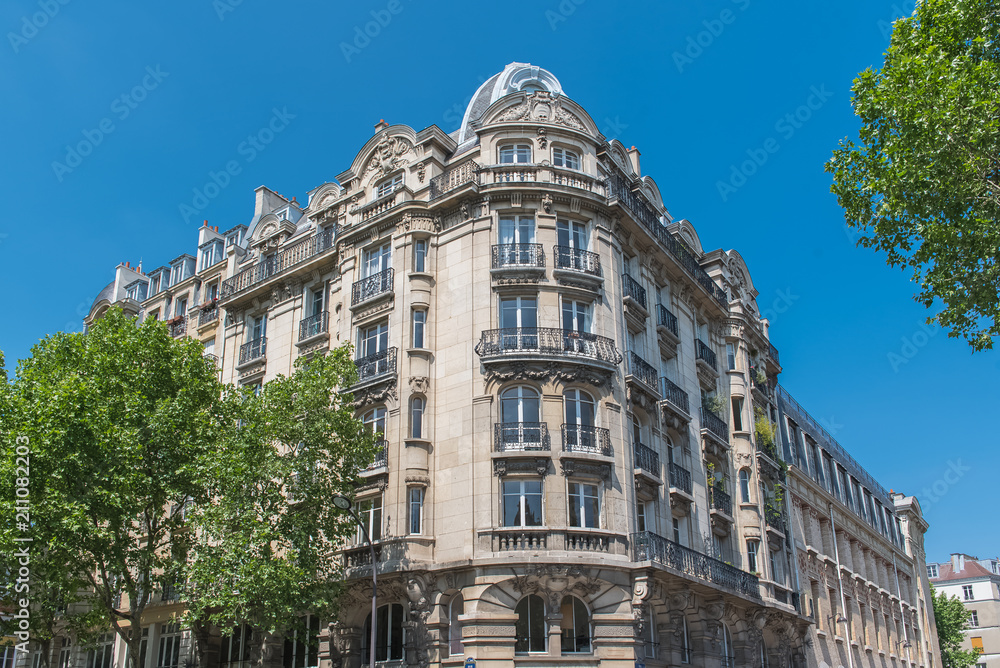 Fototapeta premium Paris, beautiful building, typical parisian facade in the Marais 