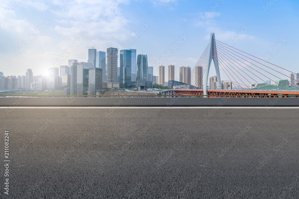 Fototapeta premium Prospects for expressway, asphalt pavement, city building commercial building, office building