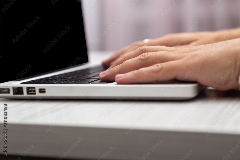 man working on a laptop close-up man working on a laptop close-up