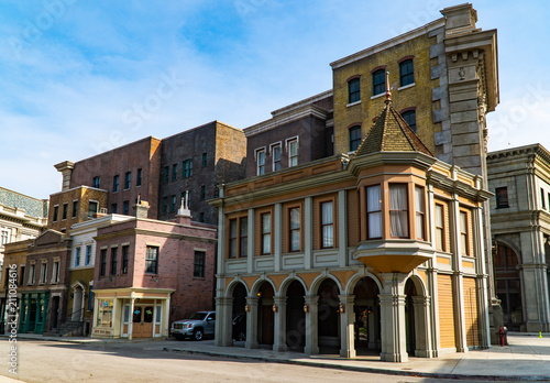 Empty city street with colorful buildings