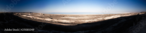 Panorama view to Aral sea from the rim of Plateau Ustyurt near Aktumsuk cape at sunset  Karakalpakstan  Uzbekistan