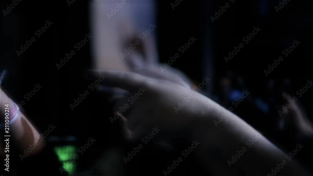 Blurred Concert Audience Cheering with Raised Hands Blurred Concert Audience Cheering with Raised Hands