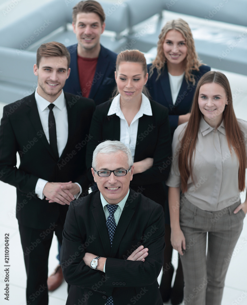view from the top. group of smiling business people looking at camera. view from the top. group of smiling business people looking at camera.