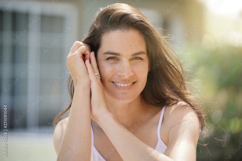 Portrait of attractive 40-year-old brunette woman Portrait of attractive 40-year-old brunette woman