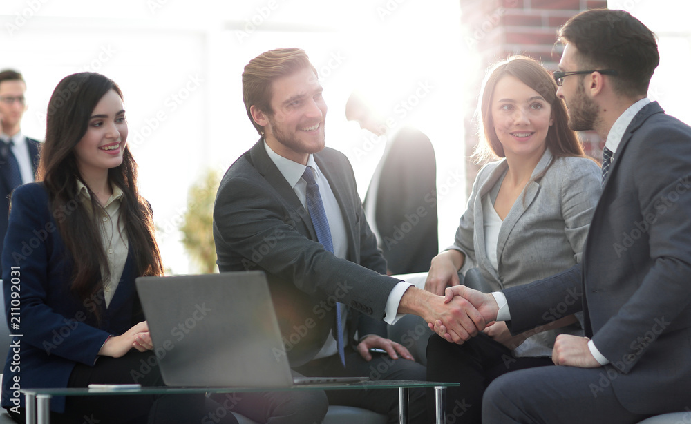 Successful partnership in business displayed by shaking hands in Successful partnership in business displayed by shaking hands in