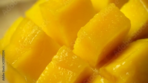 Rotation of rip mango slice cubes cut