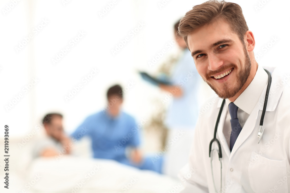 closeup.smiling doctor on blurred background. closeup.smiling doctor on blurred background.