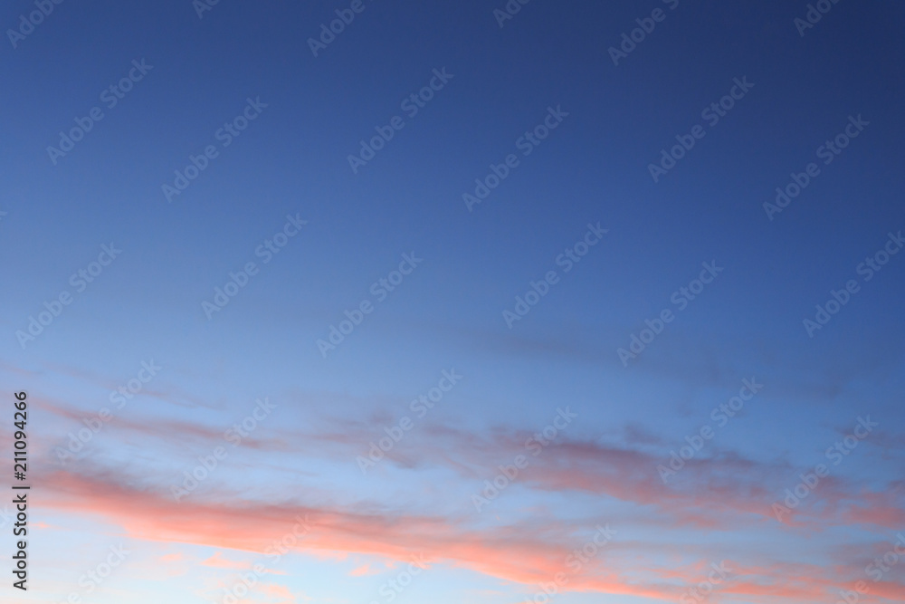 Beautiful sunset sky with pink and blue colors