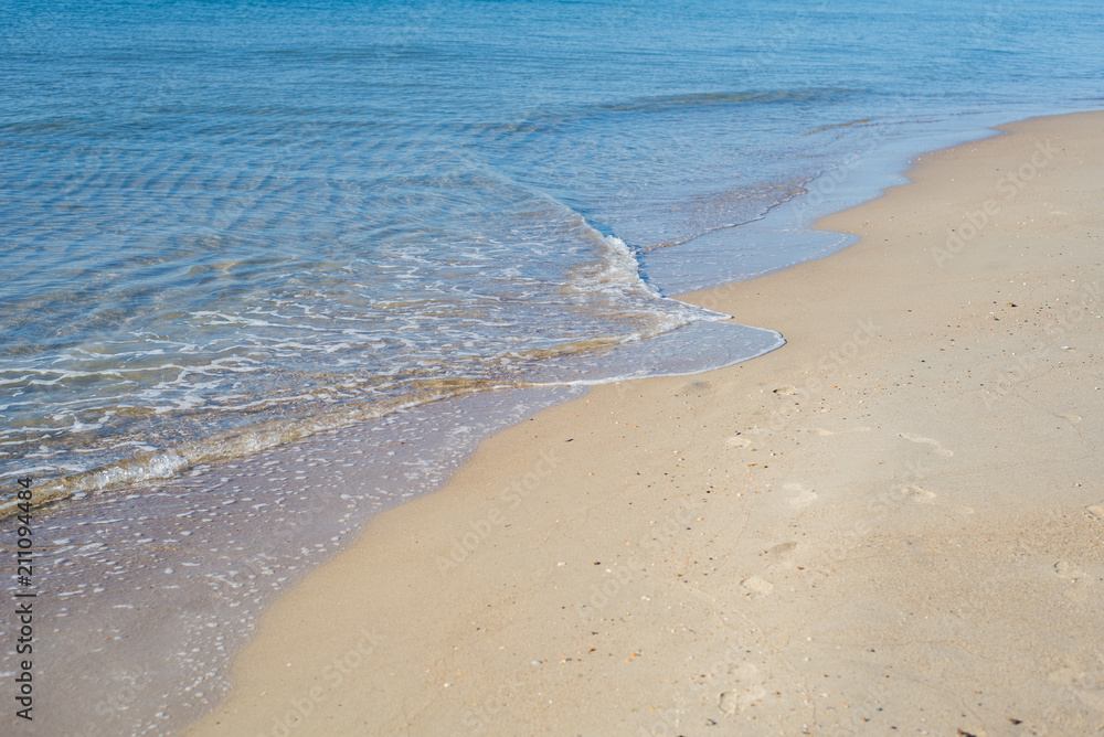 Beautiful waves on the beach from the ocean or the sea Beautiful waves on the beach from the ocean or the sea