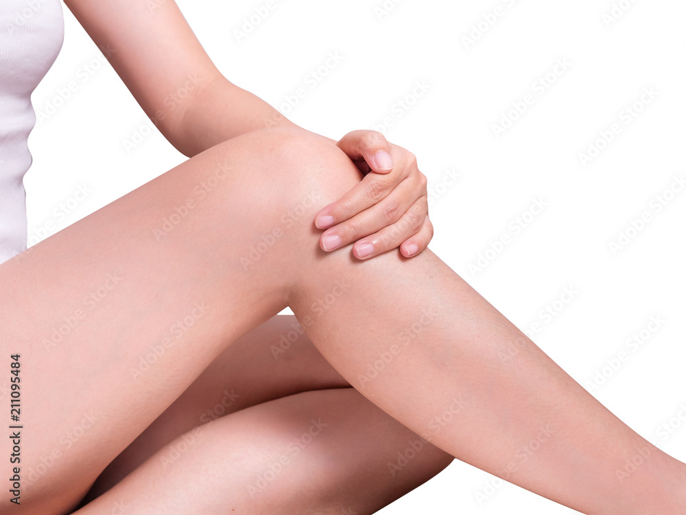 closeup shot of beautiful female's hand touching perfect hairless soft and silky long legs skin isolated on white background, studio shot. hair removal and epilation concept closeup shot of beautiful female's hand touching perfect hairless soft and silky long legs skin isolated on white background, studio shot. hair removal and epilation concept