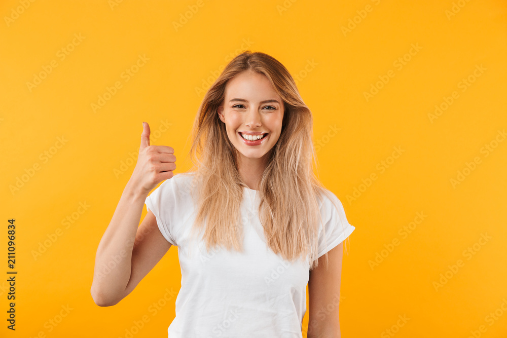 Obraz premium Portrait of a cheerful young blonde girl