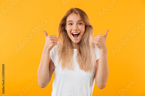 Portrait of an excited young blonde girl
