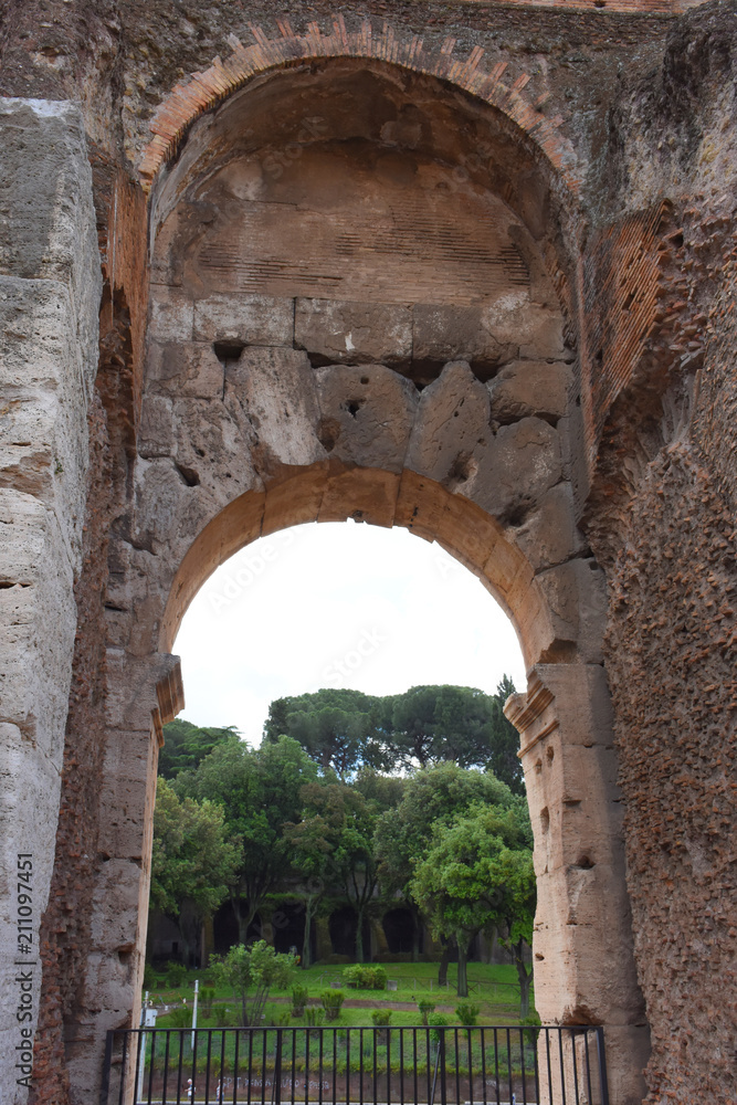 Italy, Rome, Colosseum. View of internal and external architectures. Known as the Flavian Amphitheater, it is the largest amphitheater in the world, located in the city center of Rome.