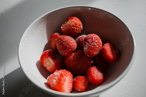  strawberries in a white plate