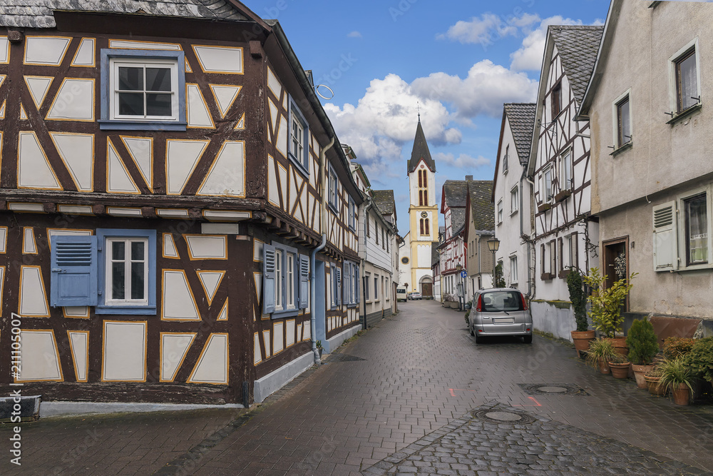 one of the typical narrow streets in old German cities one of the typical narrow streets in old German cities