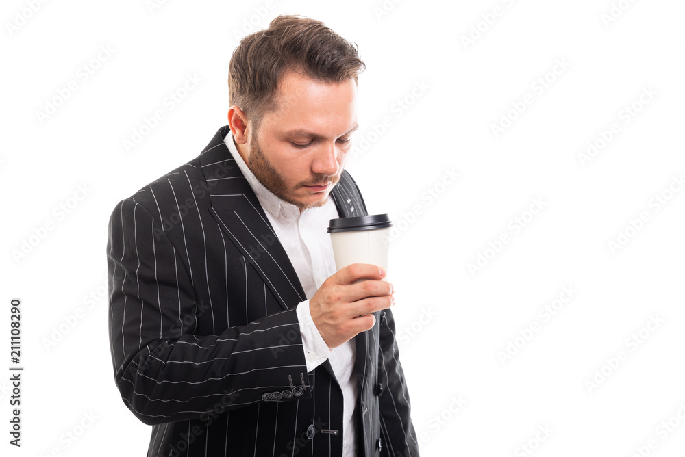 Portrait of business man enjoying a coffee to go cup. Portrait of business man enjoying a coffee to go cup.