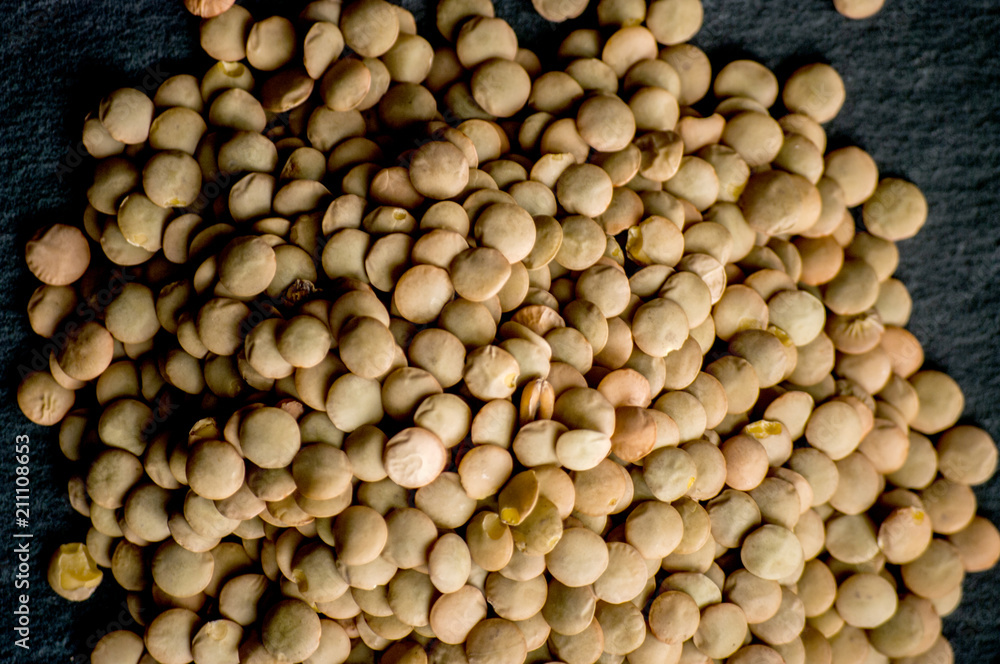 Dry Organic Brown Lentils against a background Dry Organic Brown Lentils against a background