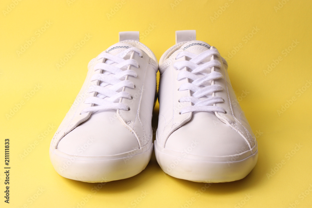 men's gym shoes on a colored background. Men's footwear. minimalism. men's gym shoes on a colored background. Men's footwear. minimalism.
