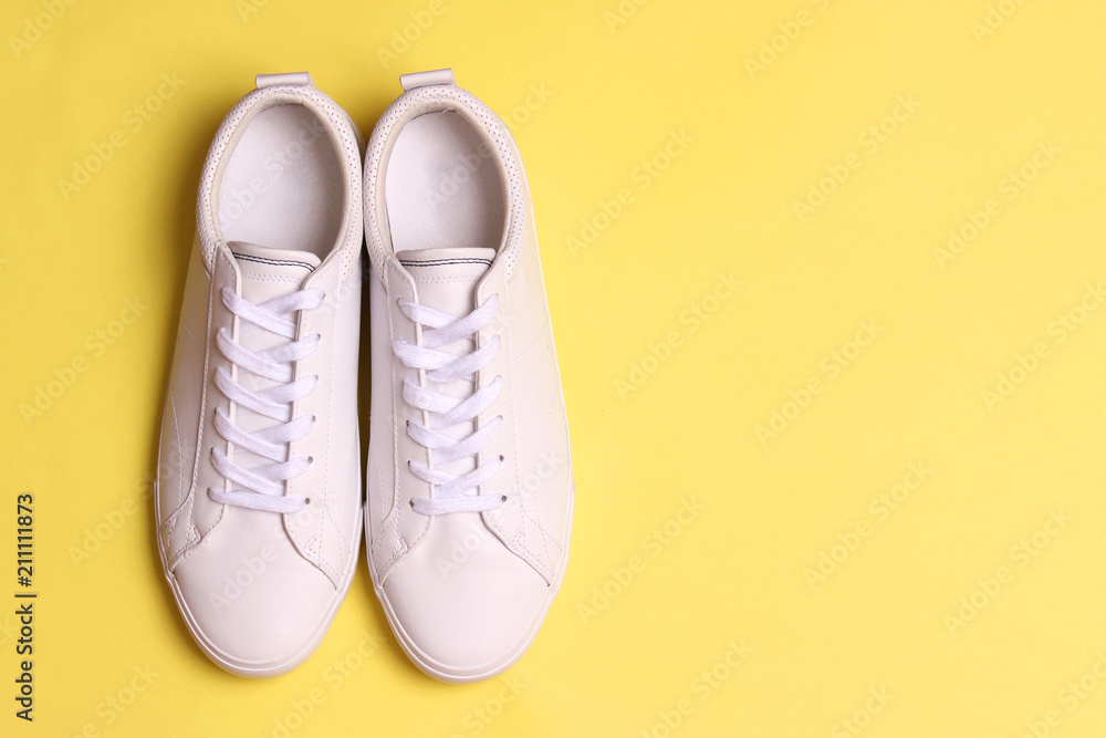 men's gym shoes on a colored background top view. men's footwear. minimalism men's gym shoes on a colored background top view. men's footwear. minimalism