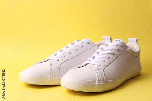 men's gym shoes on a colored background. Men's footwear. minimalism.