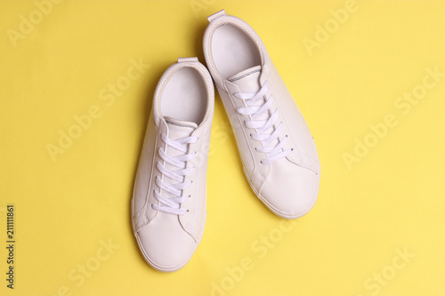men's gym shoes on a colored background top view. men's footwear. minimalism