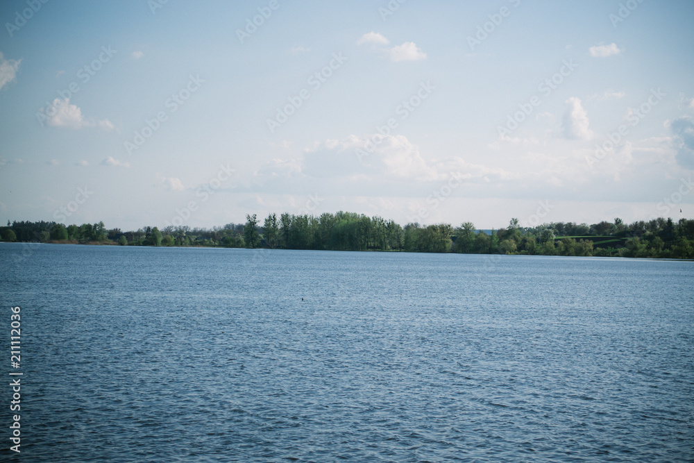 Spring evening sunny landscape near the river Spring evening sunny landscape near the river