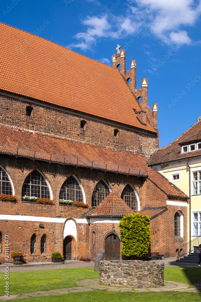 Olsztyn, Poland - Main wing and inner courtyard of the Warmian Bishops Castle in historical quarter of Olsztyn old town