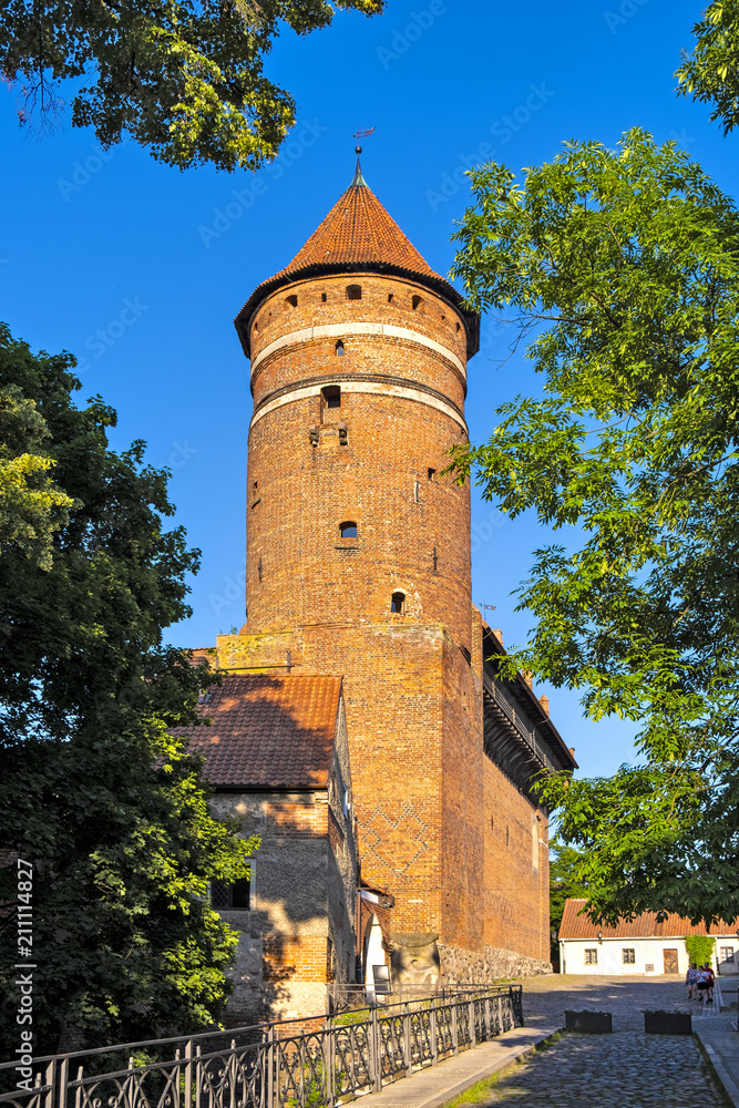 Olsztyn, Poland - Defense tower in Castle of Warmian Bishops in historical quarter of Olsztyn old town