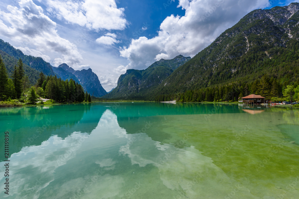 Lake Dobbiaco (Toblacher See, Lago di Dobbiaco) in Dolomite Alps, South Tirol, Italy - Travel destination in Europe Lake Dobbiaco (Toblacher See, Lago di Dobbiaco) in Dolomite Alps, South Tirol, Italy - Travel destination in Europe