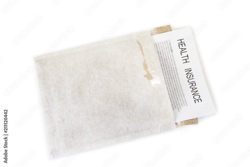 Health insurance in the envelope on the white Health insurance in the envelope on the white