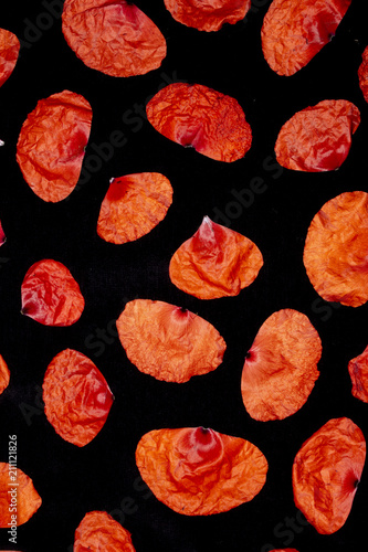 Fototapeta Naklejka Na Ścianę i Meble -  Poppies Petals on a Black Background
