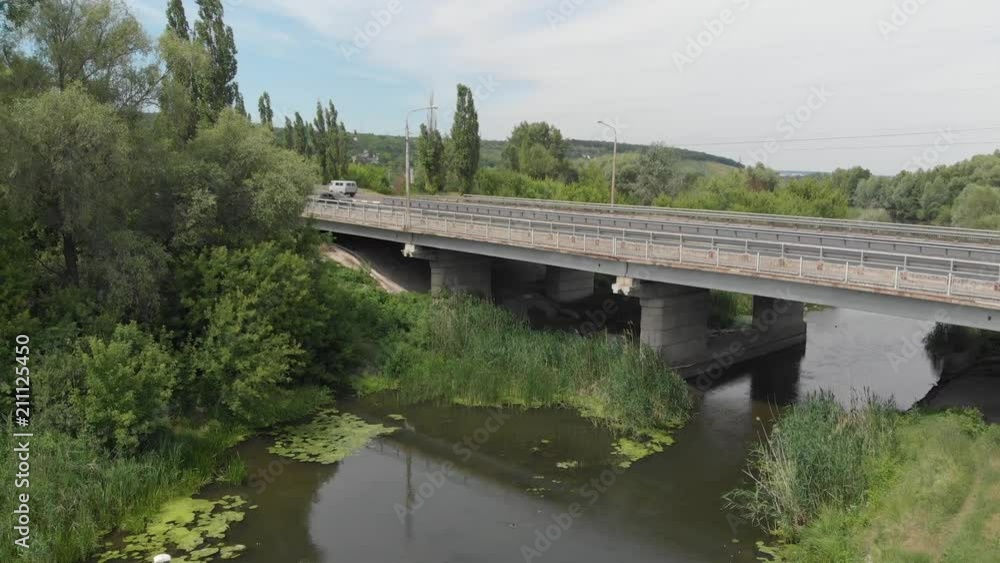 Aerial photography 4k. Road bridge over the river. Aerial photography 4k. Road bridge over the river.