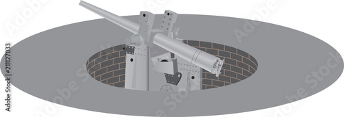 A World War Two English Coastal Defence Long Range Cannon in a concrete gun emplacement isolated on white