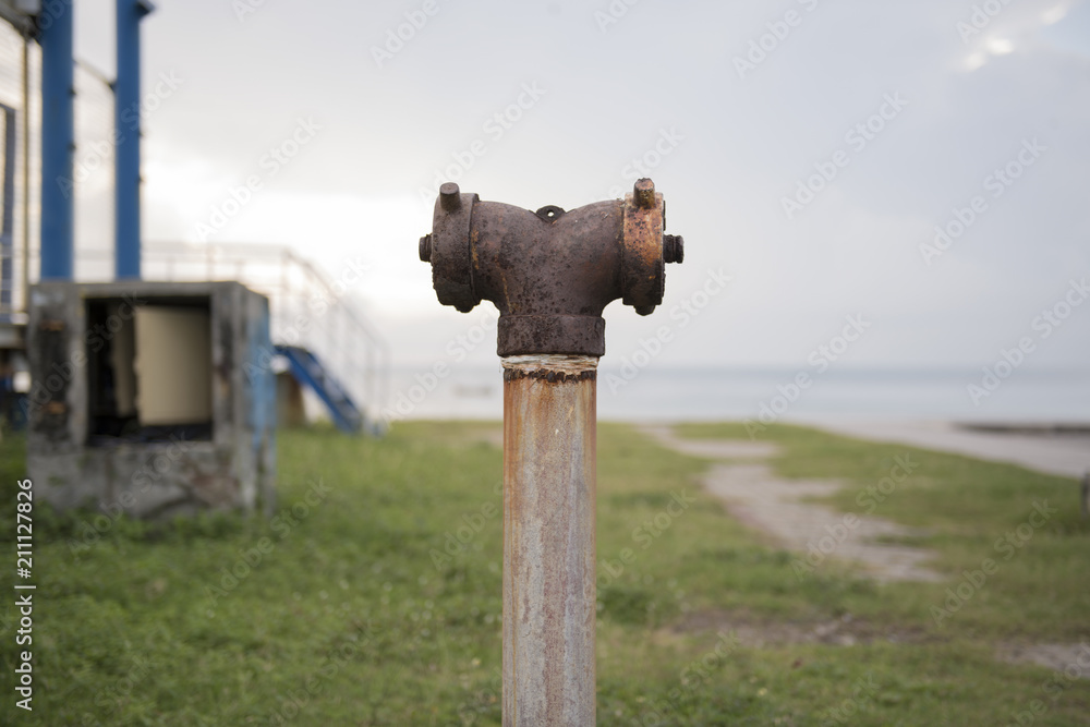 Fire hydrant that is located along the beach to prevent disaster, Songkhla province, Thailand country Fire hydrant that is located along the beach to prevent disaster, Songkhla province, Thailand country