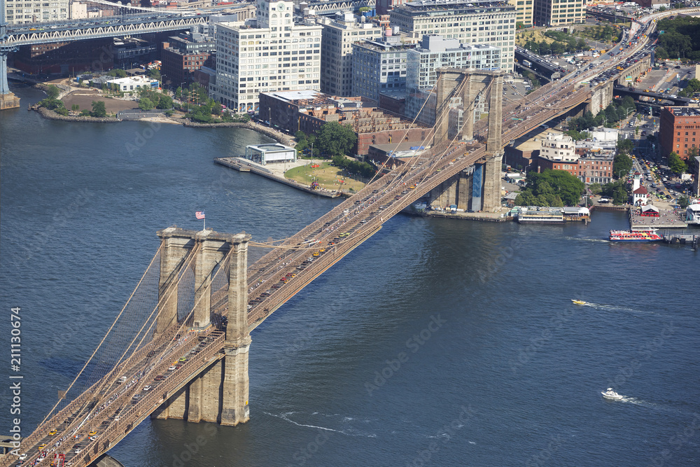 The Brooklyn Bridge over East River viewed from World Trade Center, New York, USA