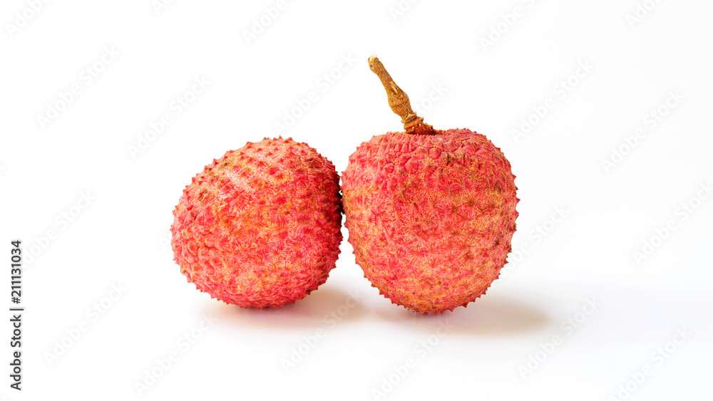 Red lychee fruit on a white background. Red lychee fruit on a white background.