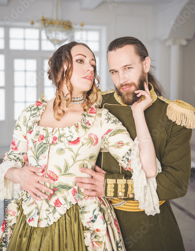 Photography Beautiful couple man and woman in medieval costumes