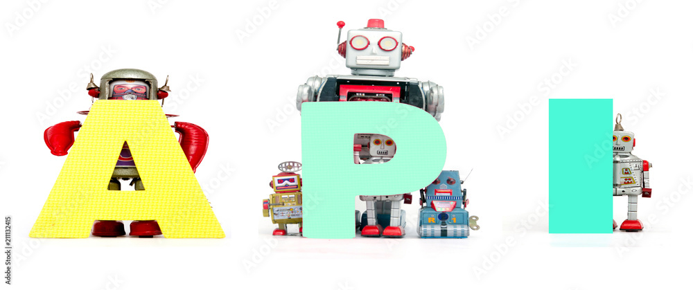 retro tin robot toys hold up the acronym API isolated