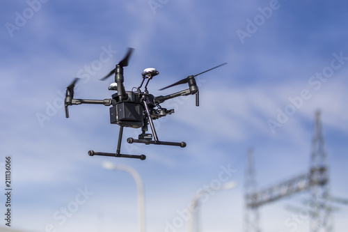 Drone inspections for Solar Energy and High Voltage Lines. Operator and screen review