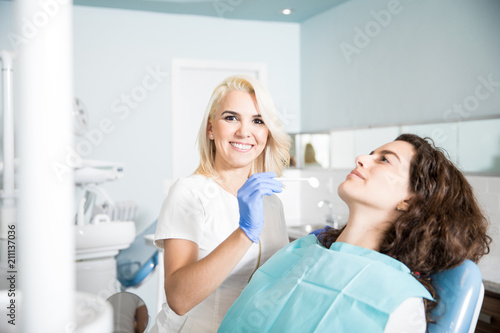 Attractive dentist working in a clinic