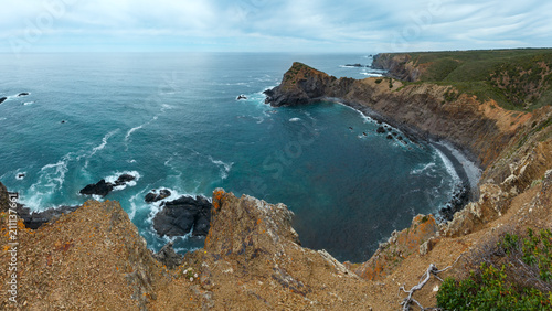 Summer Atlantic ocean rocky coastline (Algarve, Portugal).