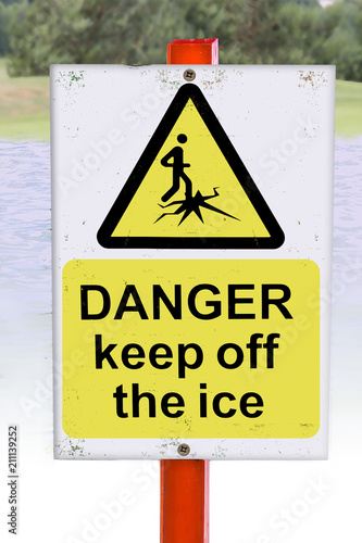 Danger Keep Off the Ice sign in yellow triangle with black text and icy water background