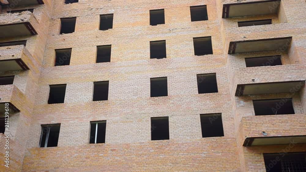 old unfinished dilapidated large building of brick old unfinished dilapidated large building of brick