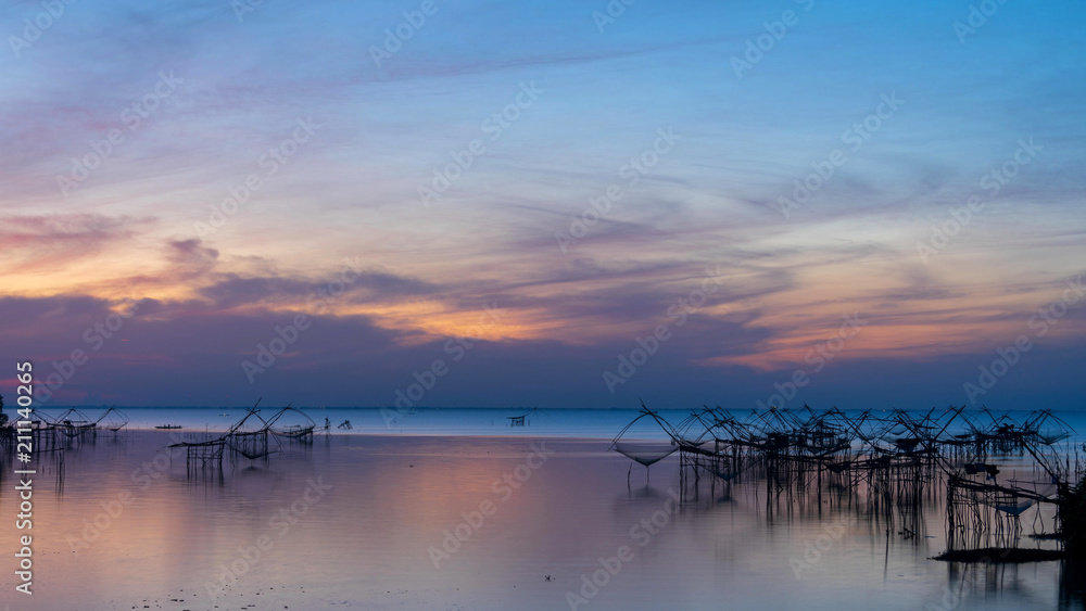 Square dip net with nice sky  in lake at Pakpra village, Phatthalung, Thailand