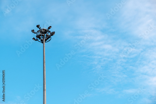 street light pole on blue sky with cloud