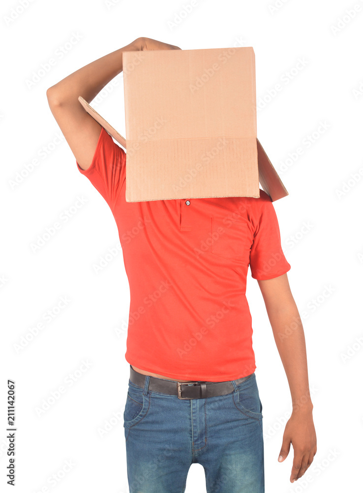 Young man gesturing with a cardboard box on his head isolated on white background Young man gesturing with a cardboard box on his head isolated on white background